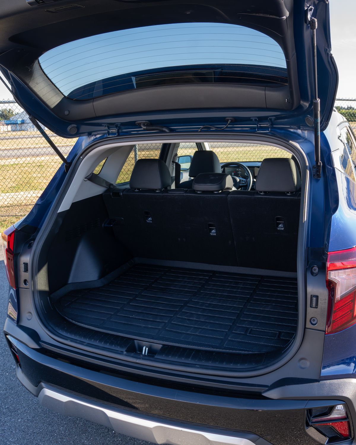 The Seltos cargo area with the tailgate open