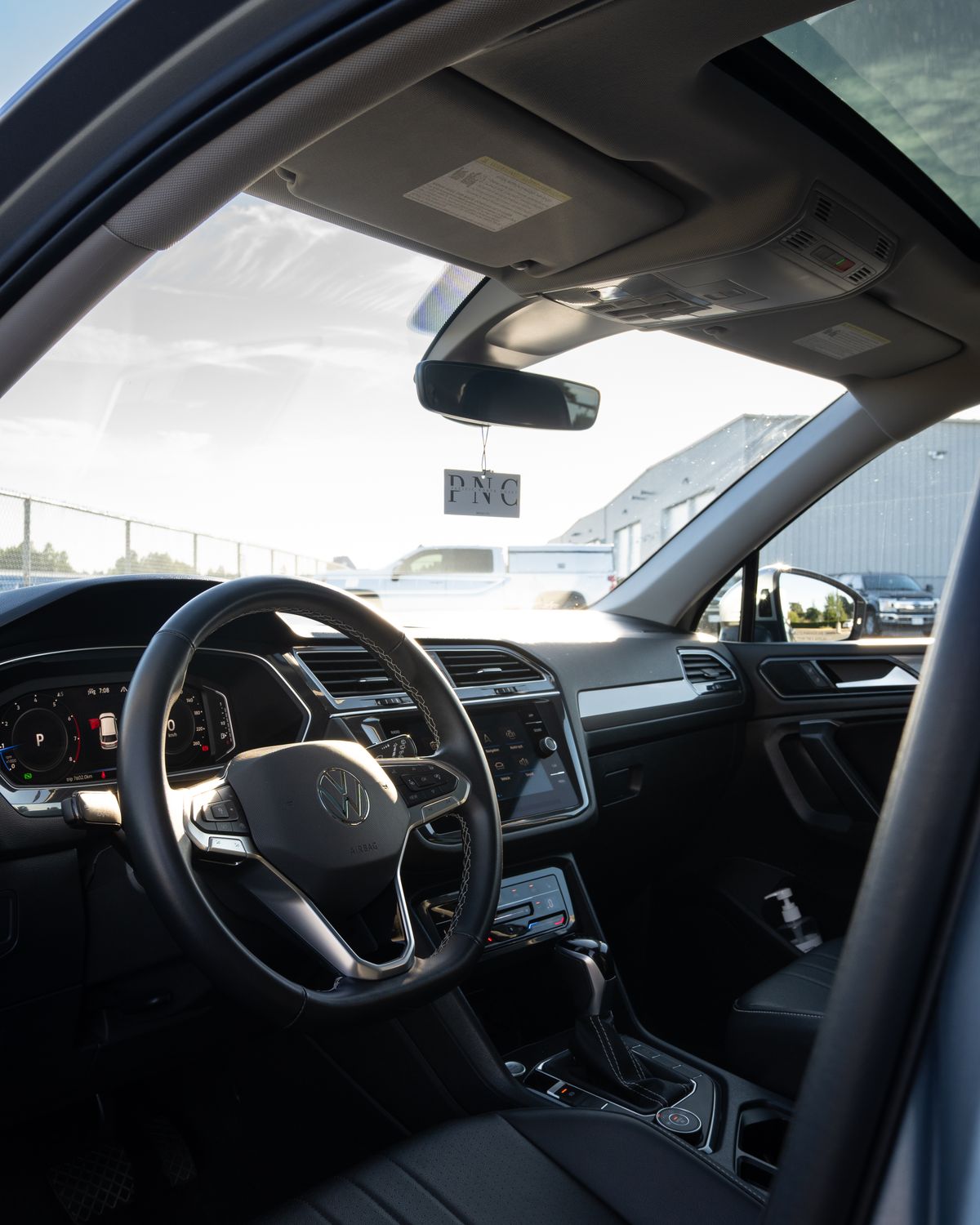 The Tiguan's cockpit through the driver's door